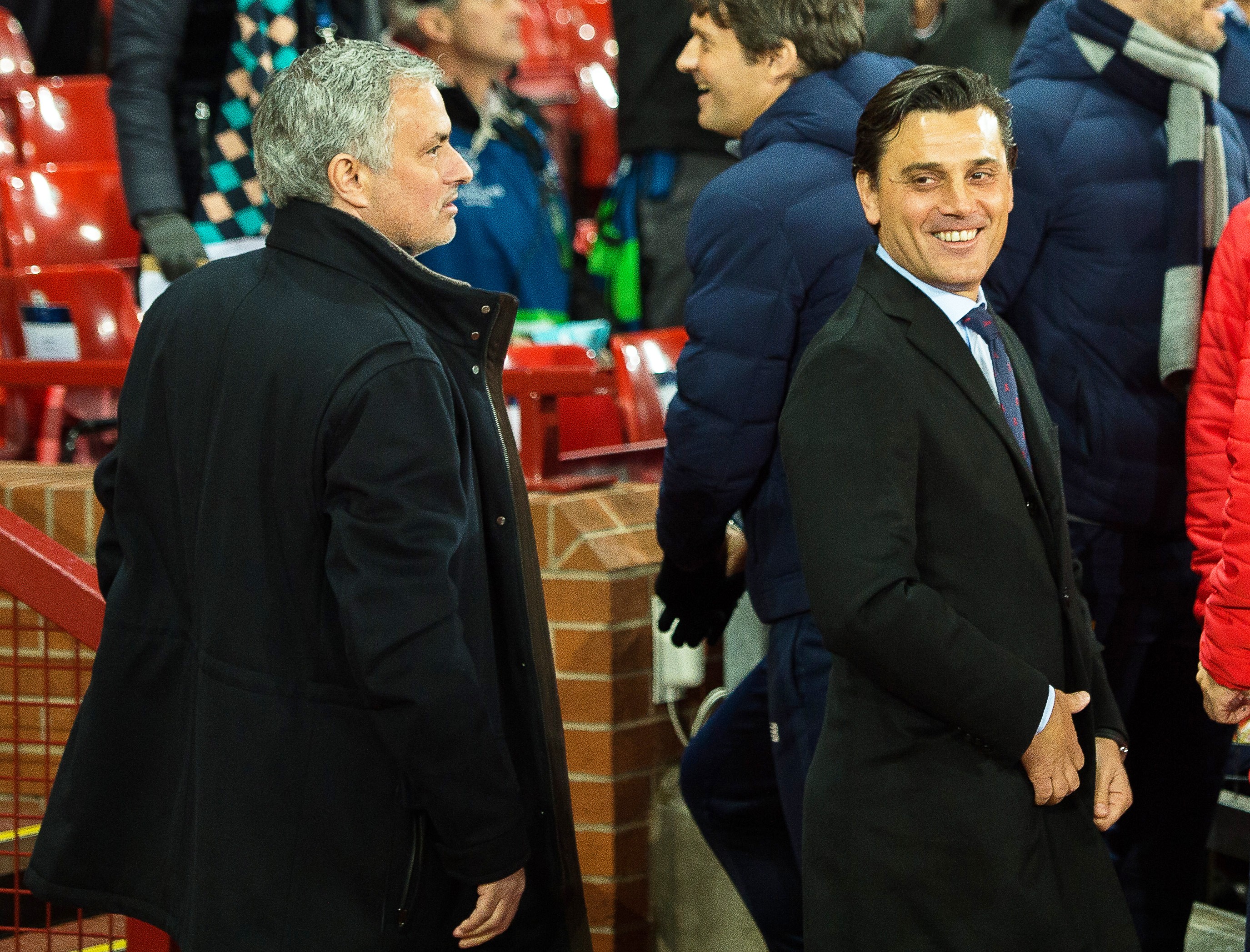 epa06603019 Manchester United manager Jose Mourinho (L) and Sevilla's head coach Vincenzo Montella (R) react during the UEFA Champions League round of 16 second leg soccer match between Manchester United and Sevilla FC at Old Trafford in Manchester, Britain, 13 March 2018. Sevilla won 2-1 on aggregate. EPA-EFE/PETER POWELL