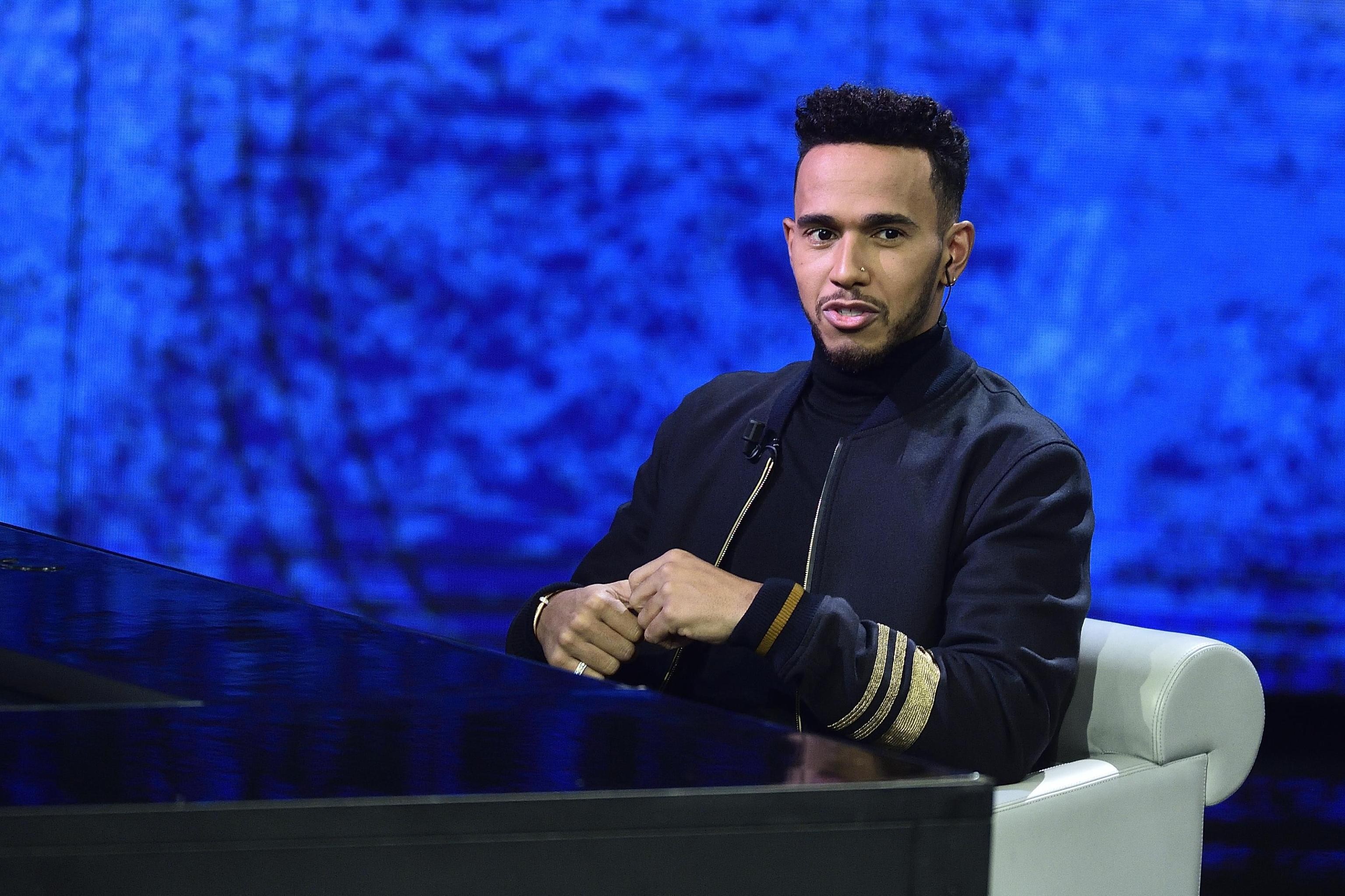 epa06396054 British Formula One driver Lewis Hamilton takes part in the Italian television show 'Che tempo che fa', in Milan, Italy, 17 December 2017. EPA-EFE/FLAVIO LO SCALZO