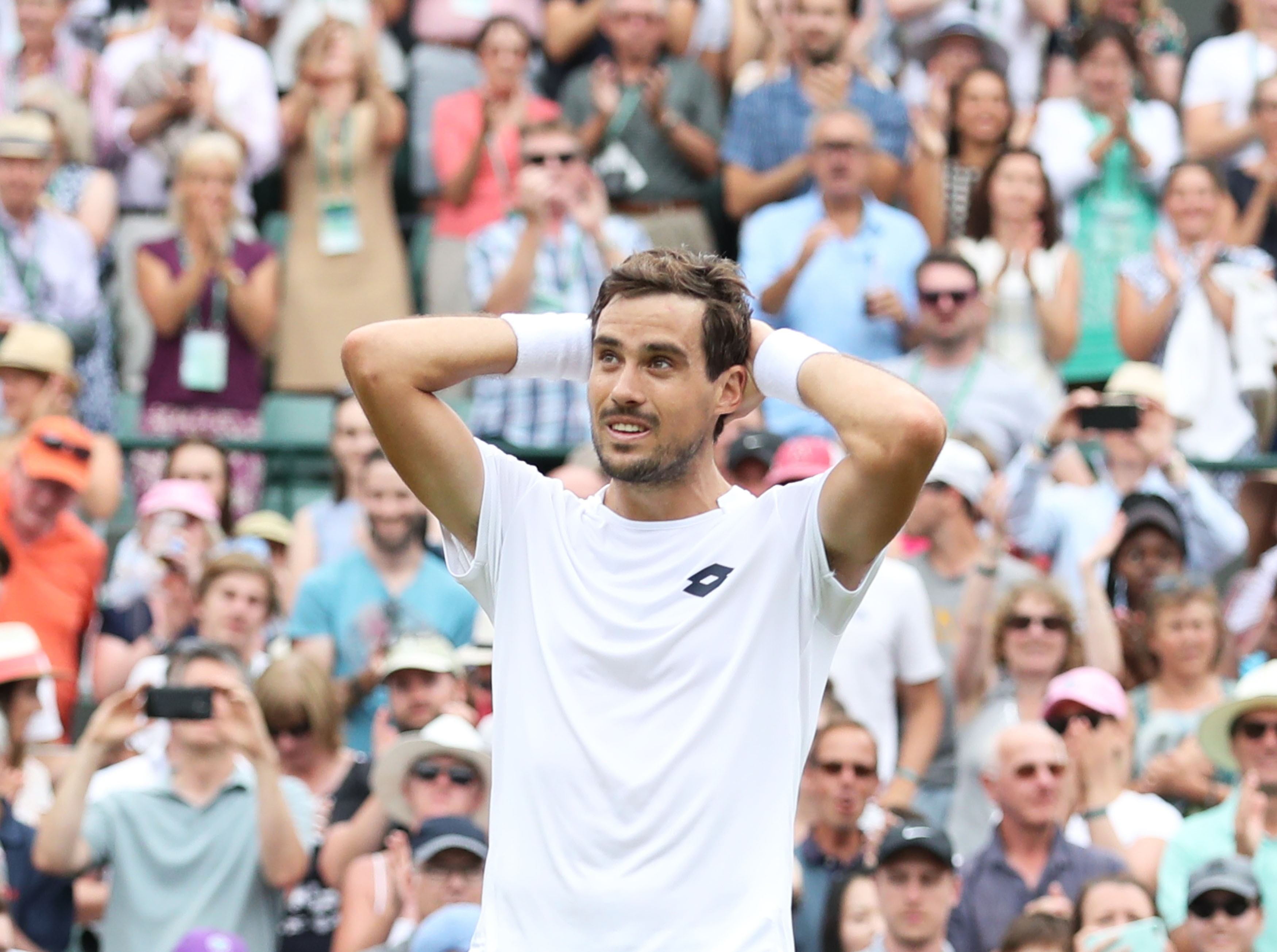epa06865769 Guido Pella of Argentina celebrates his win over Marin Cilic of Croatia in their second round match during the Wimbledon Championships at the All England Lawn Tennis Club, in London, Britain, 05 July 2018. EPA-EFE/SEAN DEMPSEY EDITORIAL USE ONLY/NO COMMERCIAL SALES