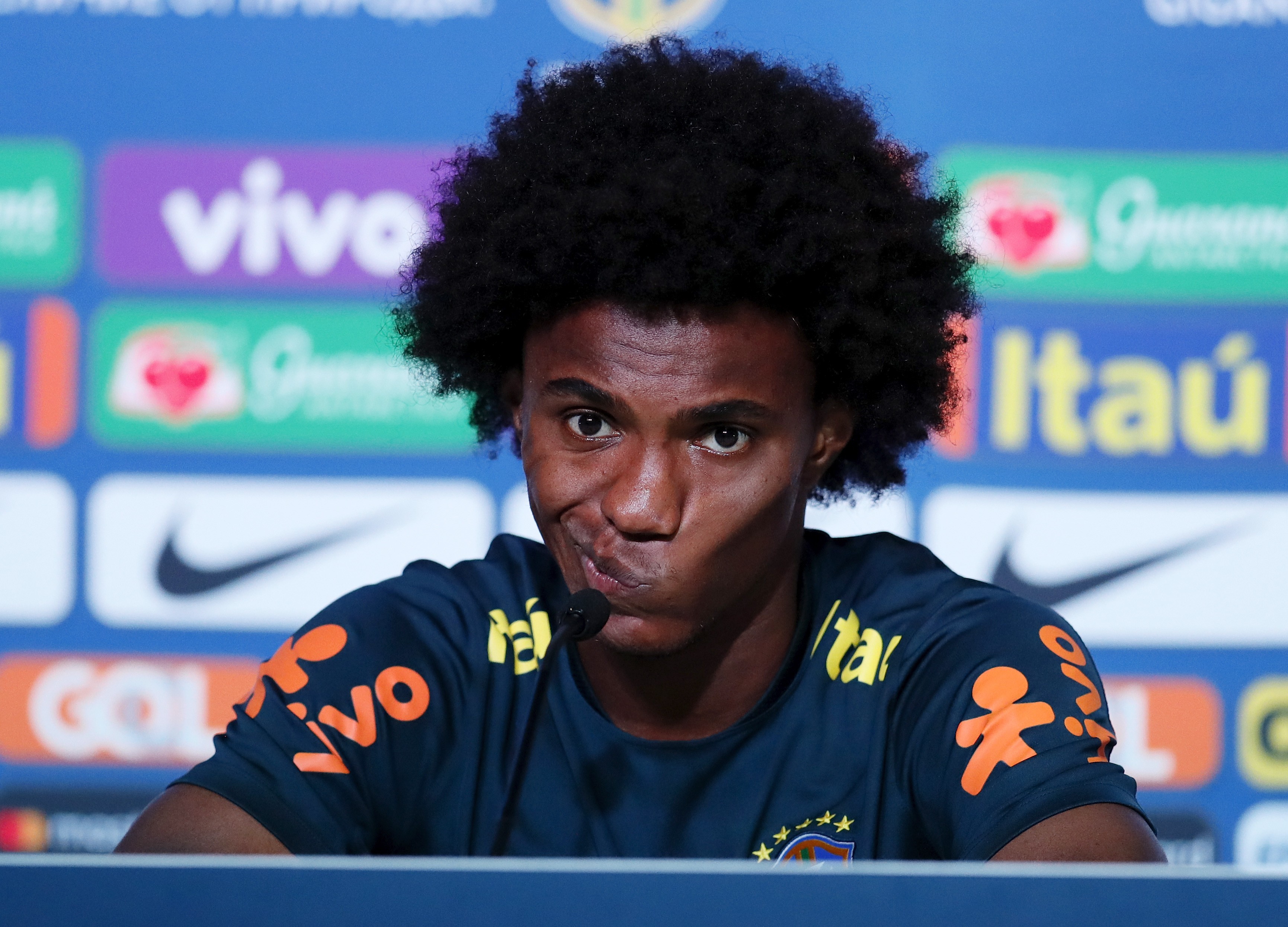 epa06864102 Brazil player Willian attends a press conference in Sochi, Russia, 04 July 2018. Brazil will face Belgium in their FIFA World Cup 2018 quarter final soccer match on 06 July 2018 in Kazan. EPA-EFE/RONALD WITTEK