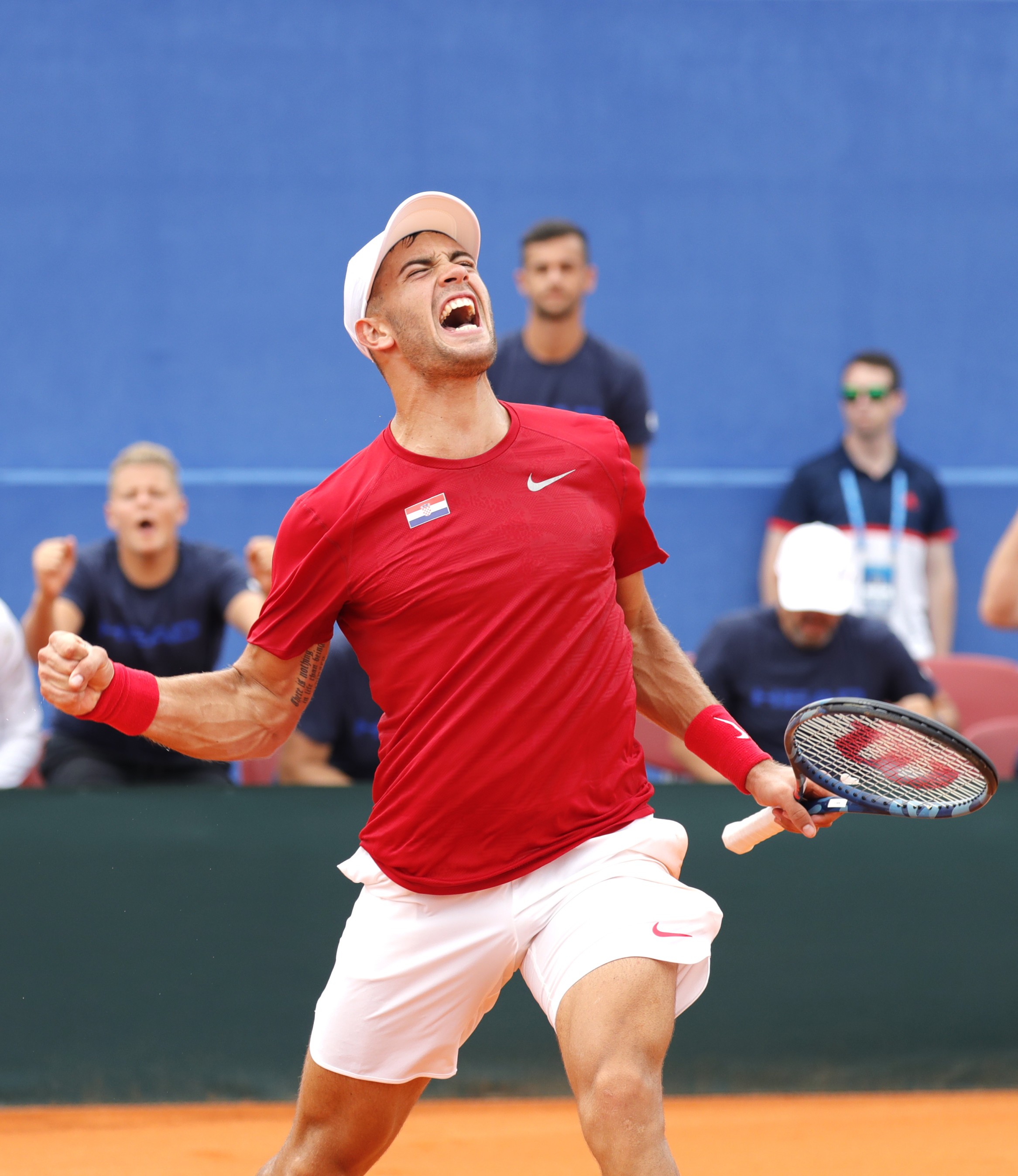 epa07019388 Borna Coric of Croatia reacts during his match against Steve Johnson of USA for the Davis Cup semi final tie between Croatia and the USA in Zadar, Croatia, 14 September 2018. EPA-EFE/ANTONIO BAT