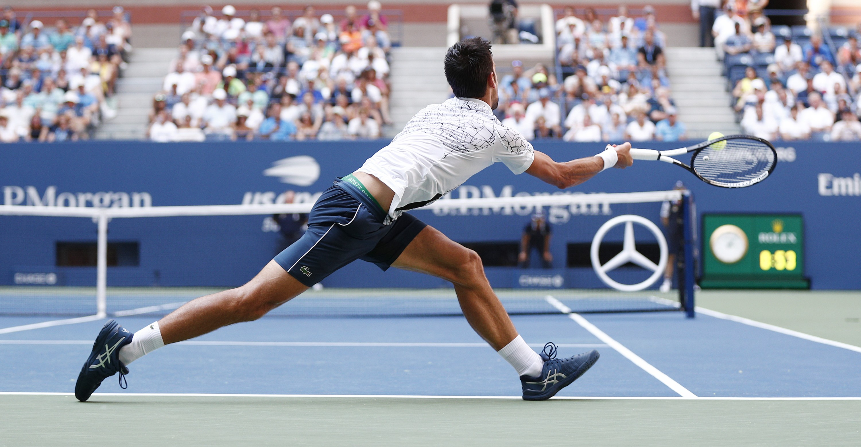 epa06995269 Novak Djokovic of Serbia hits a return to Joao Sousa of Portugal during the eighth day of the US Open Tennis Championships the USTA National Tennis Center in Flushing Meadows, New York, USA, 03 September 2018. The US Open runs from 27 August through 09 September. EPA-EFE/JUSTIN LANE