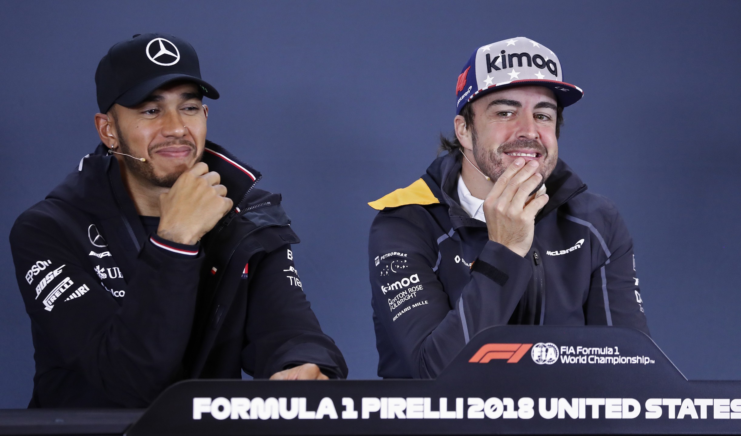 epa07102570 British Formula One driver Lewis Hamilton of Mercedes AMG GP (L) and Spanish Formula One driver Fernando Alonso of McLaren (R) during the press conference at the Circuit of the Americas, in Austin, Texas, USA, 18 October 2018. The United States Formula One Grand Prix takes place on 21 October 2018. EPA-EFE/LARRY W. SMITH