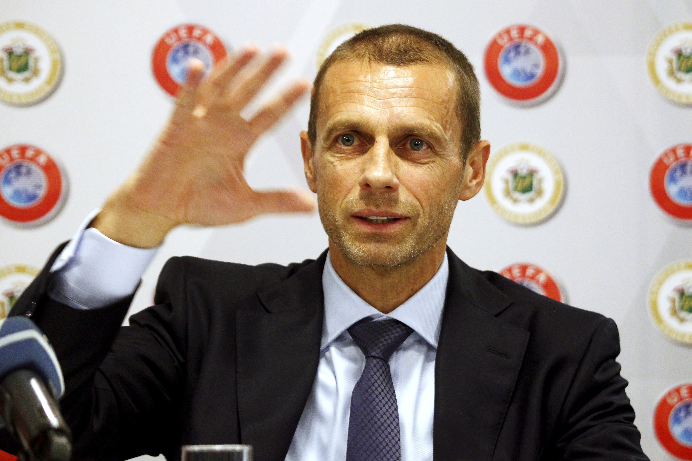 epa06876301 UEFA president Aleksander Ceferin speaks during a press conference in Riga, Latvia, 09 July 2018. Ceferin is on an one-day working visit in Riga to meet representatives of the Latvian Football Federation and the Riga municipality. EPA-EFE/TOMS KALNINS