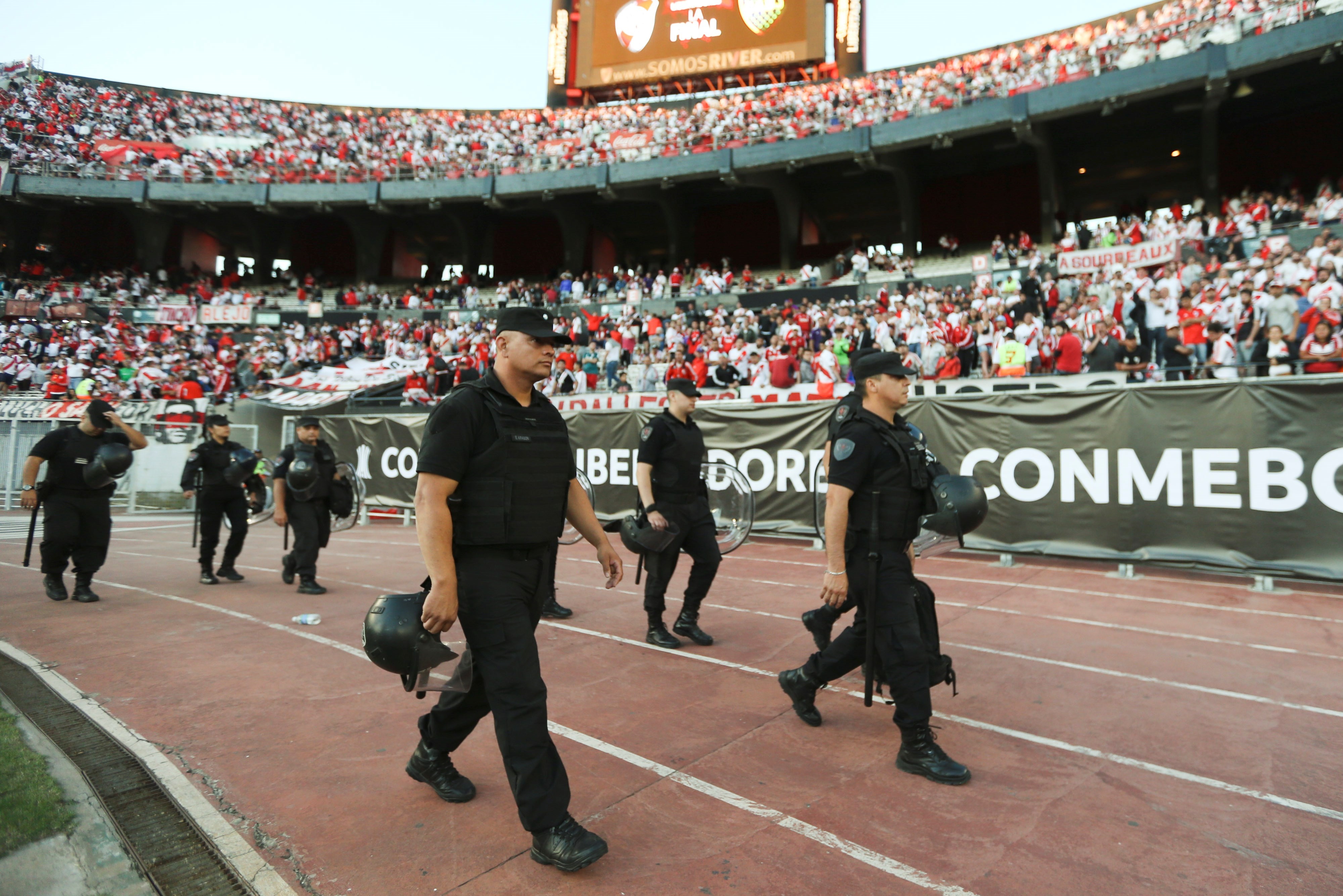 epa07188201 Members of the Argentine police patrol prior the second leg of the Copa Libertadores final between River Plate and Boca Juniors at the Estadio Monumental, in Buenos Aires, Argentina, 24 November 2018. A group of unidentified River Plate fans attacked the Boca Junior bus with stones before arriving at the Monumental stadium. The second leg of the Copa Libertadores final was postponed to 25 November. EPA-EFE/JUAN IGNACIO ROCORONI