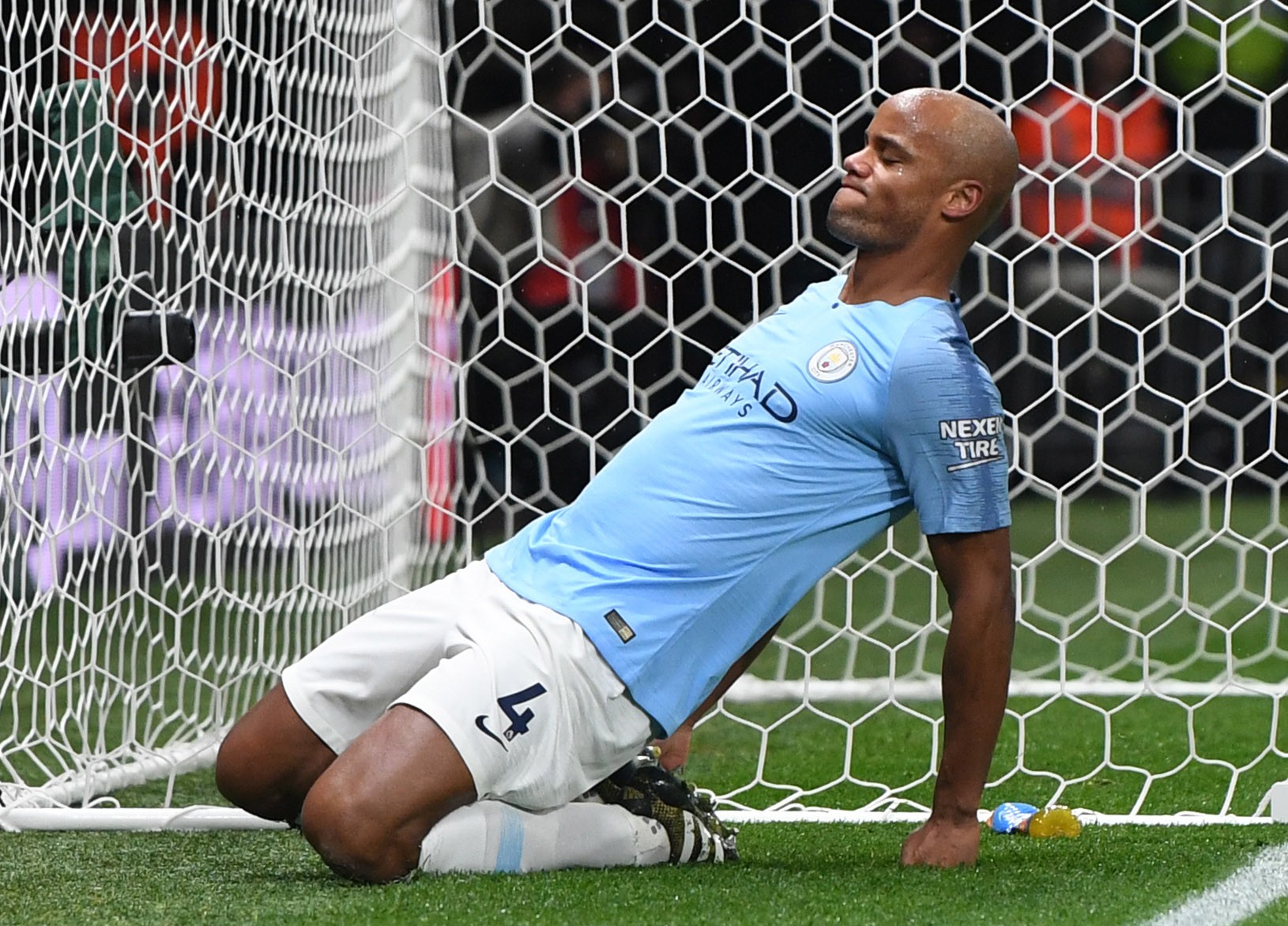 epa07208918 Manchester City's Vincent Kompany reacts after missing a chance to score during the English Premier League soccer match between Watford FC and Manchester City at Vicarage Road Stadium, Watford, north London, Britain, 04 December 2018. EPA-EFE/NEIL HALL EDITORIAL USE ONLY. No use with unauthorized audio, video, data, fixture lists, club/league logos or 'live' services. Online in-match use limited to 120 images, no video emulation. No use in betting, games or single club/league/player publications.