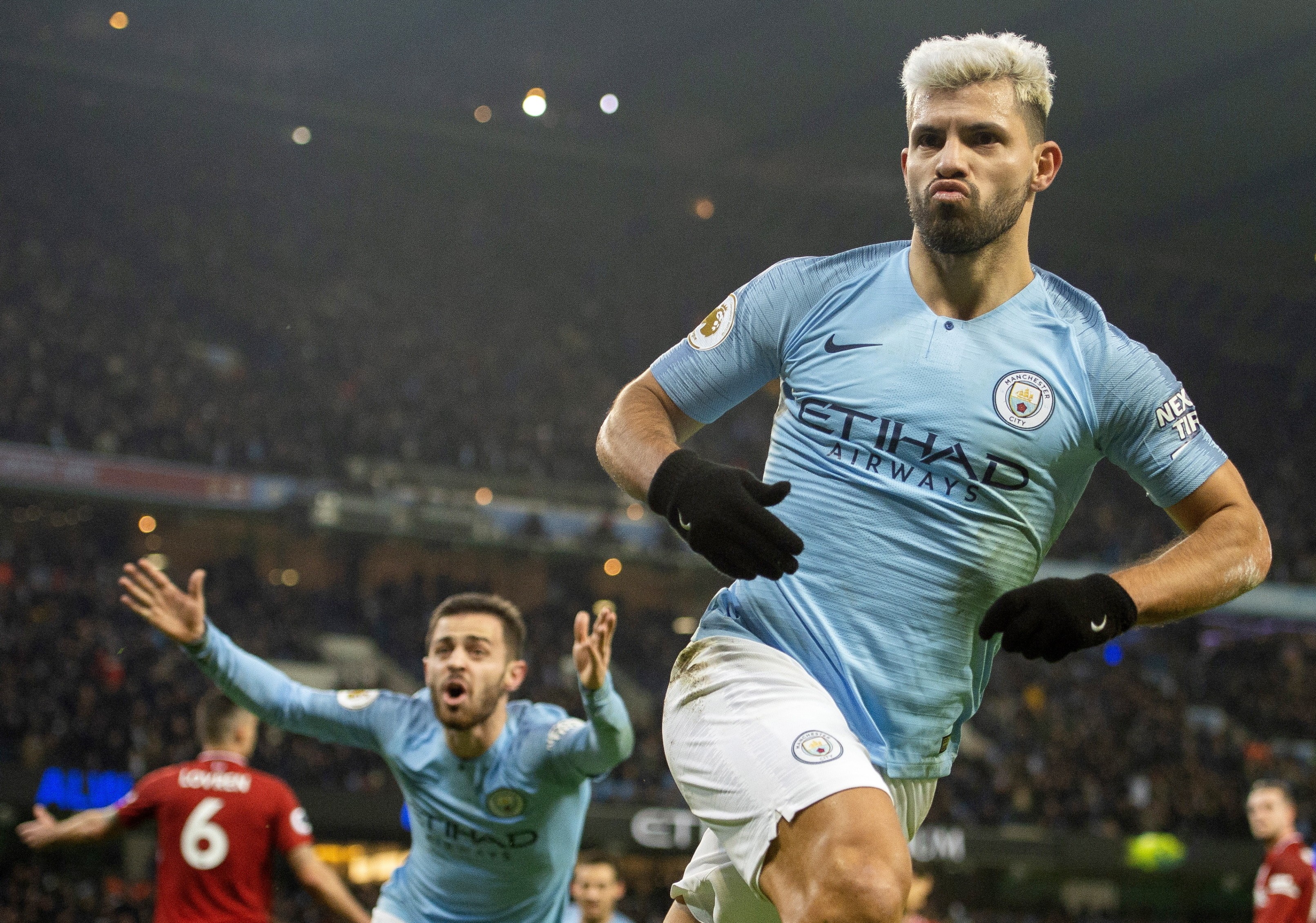 epaselect epa07260529 Manchester City's Sergio Aguero celebrates scoring the opening goal during the English Premier League soccer match between Manchester City and Liverpool at the Etihad Stadium in Manchester, Britain, 03 January 2019. EPA-EFE/PETER POWELL EDITORIAL USE ONLY. No use with unauthorized audio, video, data, fixture lists, club/league logos or 'live' services. Online in-match use limited to 120 images, no video emulation. No use in betting, games or single club/league/player publications