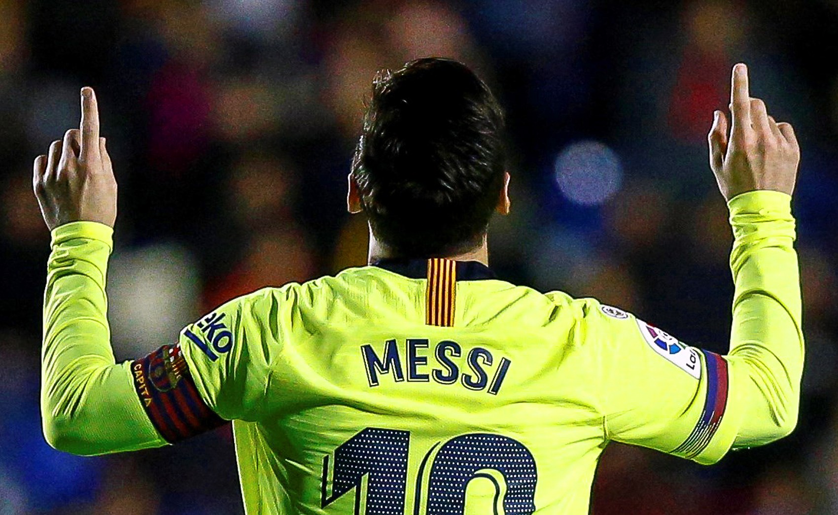 epa07236285 Barcelona's striker Lionel Messi celebrates after scoring the 3-0 lead during the Spanish La Liga soccer match between Levante UD and FC Barcelona in Valencia, Spain, 16 December 2018. EPA-EFE/BIEL ALINO