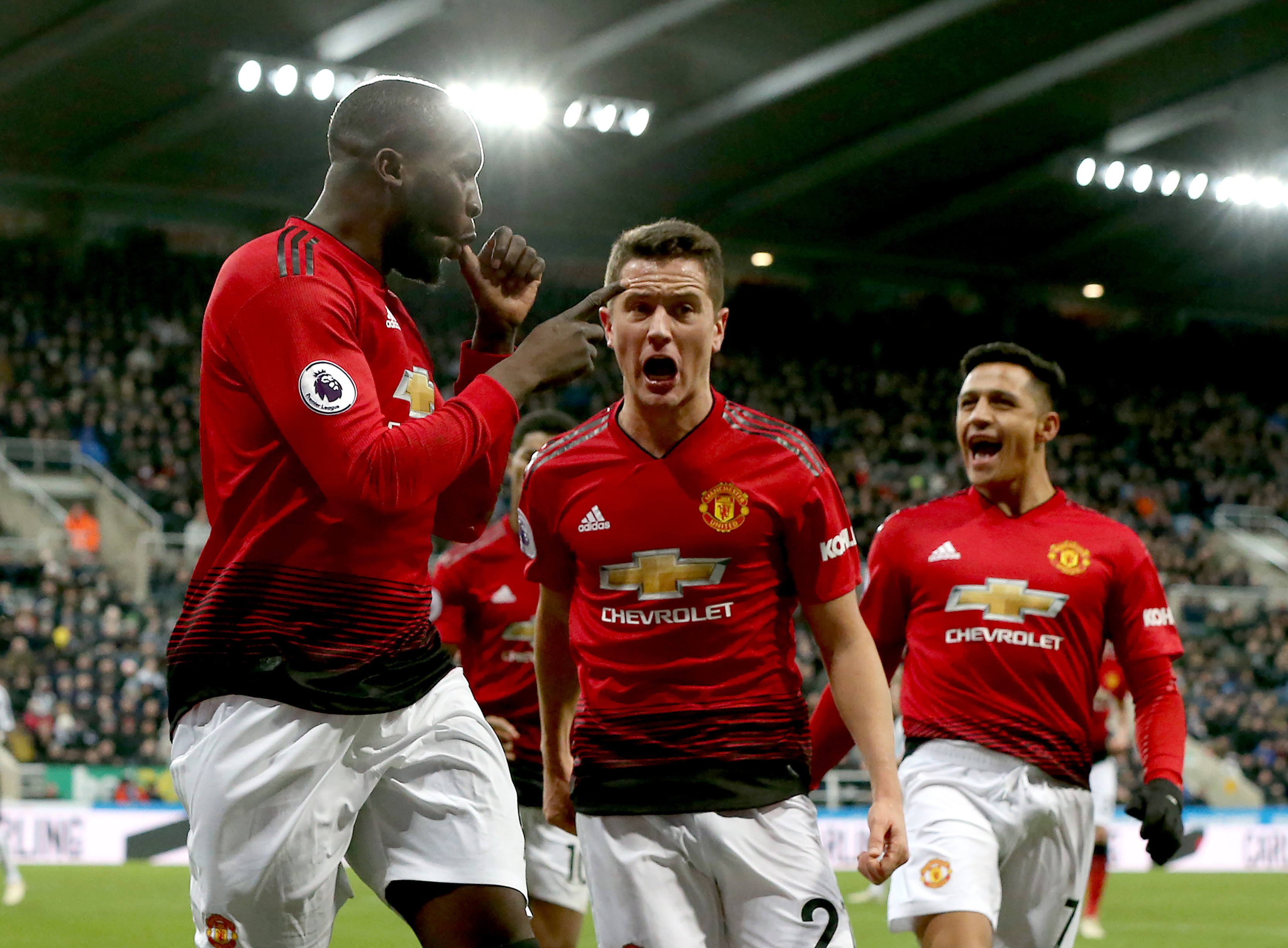epa07258859 Manchester United's Romelu Lukaku (L) celebrates scoring during the English premier league soccer match between Newcastle United and Manchester United the St James' Park Stadium in Newcastle, Britain, 2 January 2019. EPA-EFE/Nigel Roddis EDITORIAL USE ONLY. No use with unauthorized audio, video, data, fixture lists, club/league logos or 'live' services. Online in-match use limited to 120 images, no video emulation. No use in betting, games or single club/league/player publications
