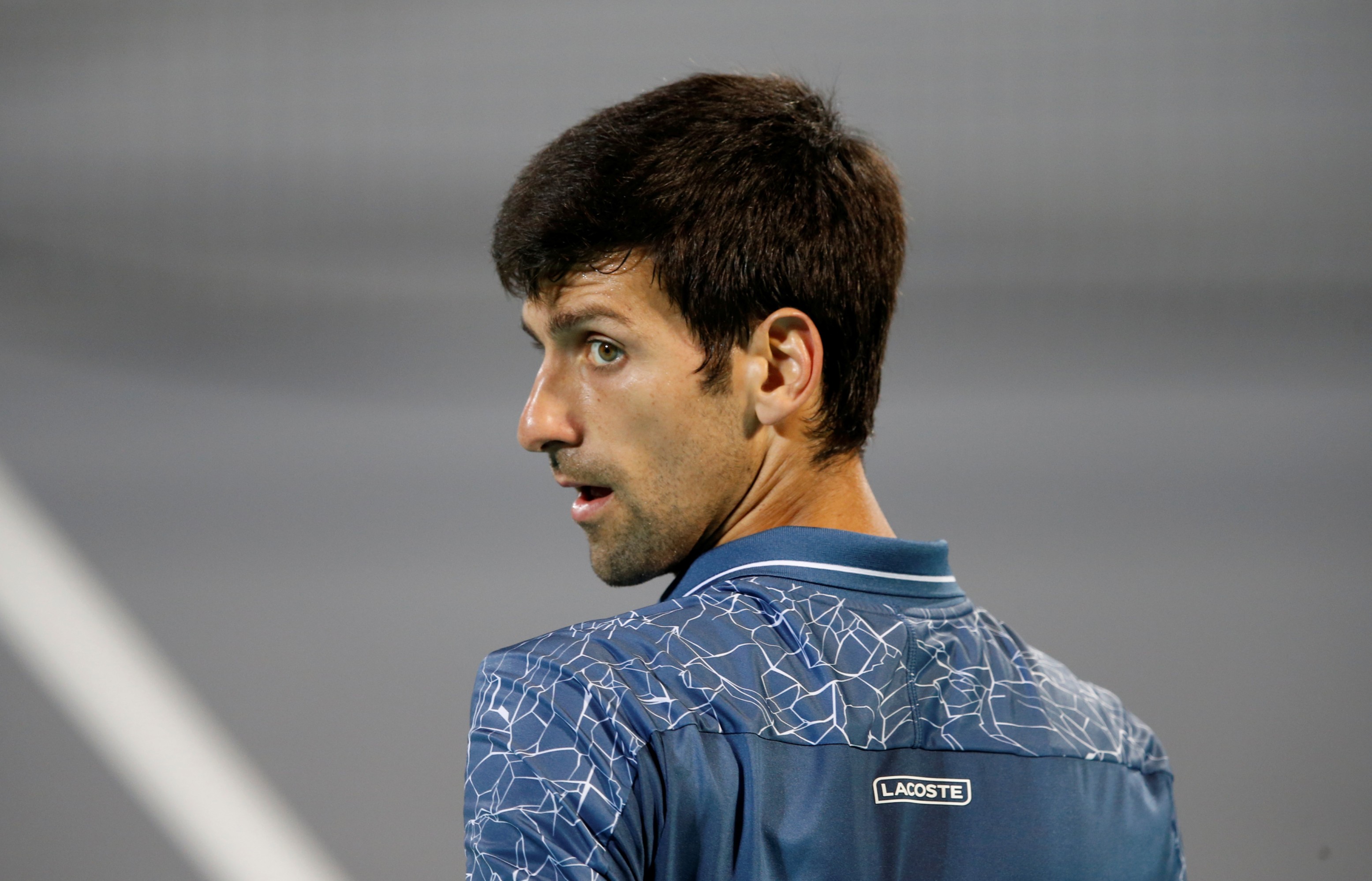 epa07253368 Novak Djokovic of Serbia in action during the final match against Kevin Anderson of South Africa at the Mubadala World Tennis Championship 2018 in Abu Dhabi, United Arab Emirates, 29 December 2018. EPA-EFE/ALI HAIDER
